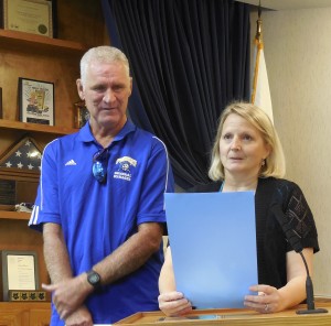 Mayor Sarah Pelican recognizes Joey Sweat's goodcitizenship.