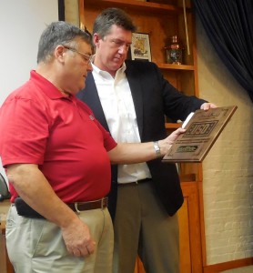 USO's Jim Bury presents Mayor Ed Boner with an award recognizing volunteer contributions of FOFA members.